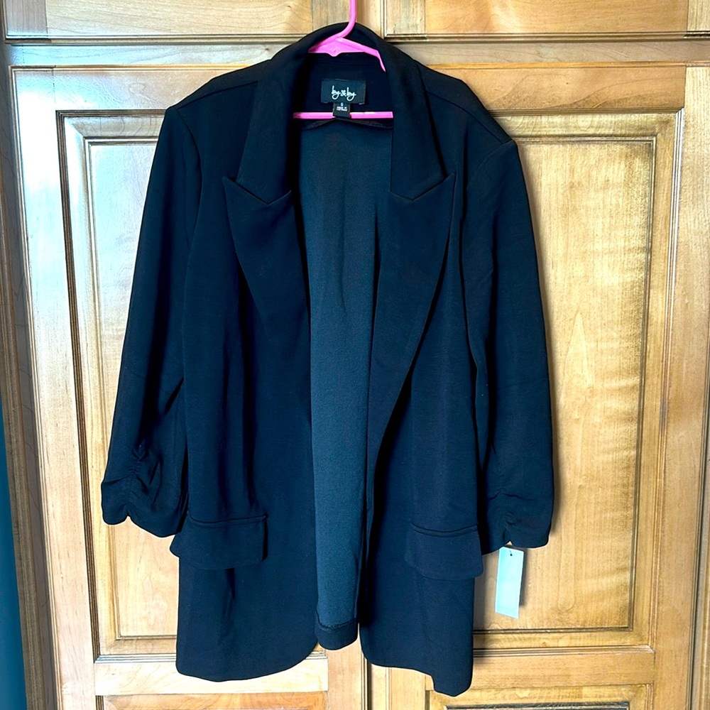 Black jacket NWT. Never Size Ladies Small.